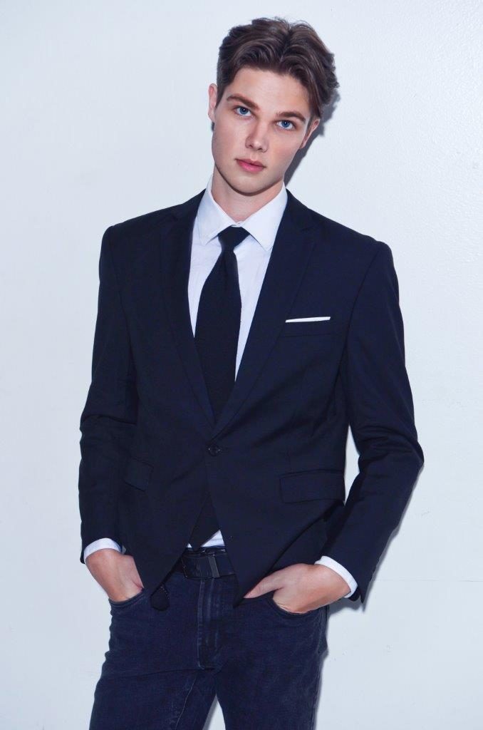 Deric Bucher, black suit